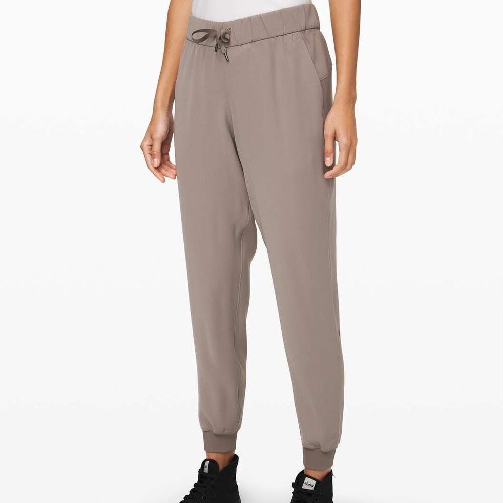 Lululemon Womens On The Fly Jogger Pants Size 12 Taupe Casual Travel Comfort